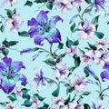 Beautiful tiger lilies on twigs on blue background. Seamless floral pattern in vivid blue, purple colors. Watercolor painting.