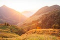 Beautiful time. Bright and colorful scenic landscape. Golden sunlight shines down around the mountains and paddy fields. Fantastic Royalty Free Stock Photo