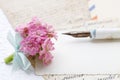 Beautiful tiny bouquet of pink kalanchoe blossfeldiana flowers and vintage letters