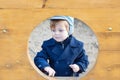 Beautiful toddler boy in blue coat on winter day Royalty Free Stock Photo