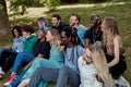 Beautiful tolerant mixed race people gathered together to show that friendship has no race