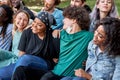 Beautiful tolerant mixed race people gathered together to show that friendship has no race