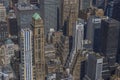 Beautiful top-down view of rooftops of skyscrapers in densely built-up Manhattan. New York,
