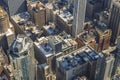 Beautiful top-down view of rooftops of skyscrapers in densely built-up Manhattan. New York,