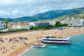 Beautiful top view of embankment and beach in popular resort town of Tossa de Mar, Costa Brava, Spain