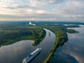 Beautiful top view of the ships leaving the canal. forest and river in Russia