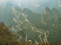 Beautiful Top view of Tongtian Road the winding Road  99  curves road to The Heaven`s Gate Royalty Free Stock Photo