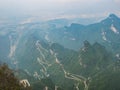 Beautiful Top view of Tongtian Road the winding Road  99  curves road to The Heaven`s Gate, Royalty Free Stock Photo