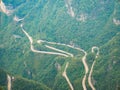 Beautiful Top view of Tongtian Road the winding Road  99  curves road to The Heaven`s Gate, Royalty Free Stock Photo