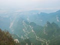 Beautiful Top view of Tongtian Road the winding Road  99  curves road to The Heaven`s Gate, Royalty Free Stock Photo