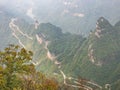 Beautiful Top view of Tongtian Road the winding Road  99  curves road to The Heaven`s Gate Royalty Free Stock Photo