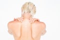 Beautiful topless woman touching her neck Royalty Free Stock Photo