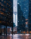 Beautiful Toronto tower with skyscrapers during snowfall