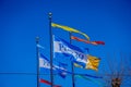Beautiful touristic view of Pier 39 flags in the popular and cultural downtown area of San Francisco Royalty Free Stock Photo