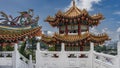 The beautiful tower of a Chinese Thean Hou Temple against a blue sky and clouds. Royalty Free Stock Photo