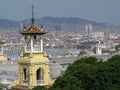 Beautiful tower with a tiled roof in Plaza de Espana on the background of Barcelona panorama. Belvedere in oriental style on Spain