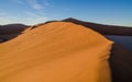 Beautiful towering red sand dunes at famous Deadvlei near Sossusvlei in Namib desert, Namibia, Southern Africa Royalty Free Stock Photo