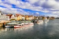 Traditional colorful houses,boats and Danube river in Regensburg town,Bavaria,Germany. Royalty Free Stock Photo