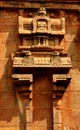 Beautiful traditional architecture design on the stone tower wall in the ancient Brihadisvara Temple in Thanjavur, india. Royalty Free Stock Photo