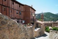 Beautiful traditional buildings at Albarracin, surrounded by mountains. Sunny day, no people. Teruel, Aragon, Spain Royalty Free Stock Photo