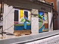 Beautiful traditional colorful Puerto Rican wallart on Rua Fortaleza in old town San Juan in warm sunlight