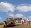 Beautiful traditional fishing boat and restored lifeguard station