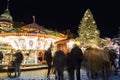 Beautiful traditional German Christmas Market square in Magdeburg city center Germany with many carousel, christmas tree Royalty Free Stock Photo