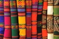 Beautiful traditional Peruvian textile folded neatly and vertically, genuine aguayo fabric