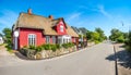 Beautiful and traditional thatched house in german north sea village Royalty Free Stock Photo