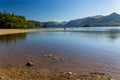 Beautiful, tranquil lake with swimmers on a hot summers day (Derwentwater, Lake District Royalty Free Stock Photo