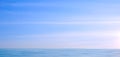 Beautiful tranquil seascape view background, Blue sky and white cloud over blue flowing sea surface in the morning Royalty Free Stock Photo