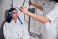 Serene patient seated in the chair before a medical procedure