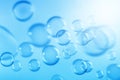 Beautiful Transparent Blue Soap Bubbles Floating in The Air. Abstract Background, Soap Suds Bubbles Water. Royalty Free Stock Photo