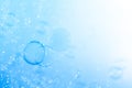 Beautiful Transparent Blue Soap Bubbles Floating in The Air. Blue Gradient Blurred Background Royalty Free Stock Photo