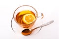 Beautiful transparent Cup with saucer with tea and lemon.