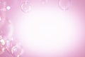 Beautiful Transparent Pink Soap Bubbles Frame on White Background. Royalty Free Stock Photo