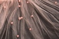 Beautiful transparent pink tulle with shiny beads background Royalty Free Stock Photo