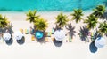 Beautiful tropical beach with colorful beach umbrellas, white sand, palm trees and turquoise ocean. The perfect paradise for your