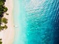 Beautiful tropical beach with crystal ocean and boat, aerial view Royalty Free Stock Photo
