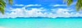 Beautiful tropical beach panorama, exotic island panoramic view, turquoise sea water, ocean waves, sand, green palm tree leaves Royalty Free Stock Photo