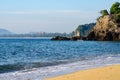 Beautiful tropical beach, soft wave hitting sandy beach under bright sunny day Royalty Free Stock Photo