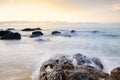 beautiful tropical beach sunrise sea view. soft wave hitting sandy beach Royalty Free Stock Photo