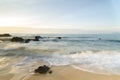 Beautiful tropical beach sunrise sea view. soft wave hitting sandy beach Royalty Free Stock Photo