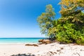 Beautiful tropical beach, white sand and blue sky background. Royalty Free Stock Photo