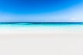 Beautiful tropical beach, white sand and blue sky background. Royalty Free Stock Photo