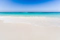 Beautiful tropical beach, white sand and blue sky background wit Royalty Free Stock Photo