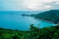 Beautiful tropical beach with white sand Islands green lush tropical island in a blue and turquoise sea for relaxing vacation