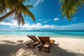 beautiful tropical beach with white sand and two sunbeds framed with palms. Bright crystal clear see. tropical vacation Royalty Free Stock Photo