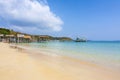 Beautiful tropical beach with wooden pier Royalty Free Stock Photo