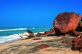 Beautiful tropical coast with big stones and black sand of the I Royalty Free Stock Photo